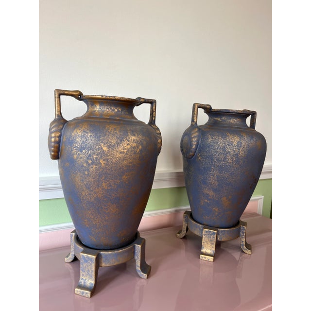 Gold pattern purple vase or urns with snake head handles, come with a matching base Vase Dimensions 13x12x16 H Base...