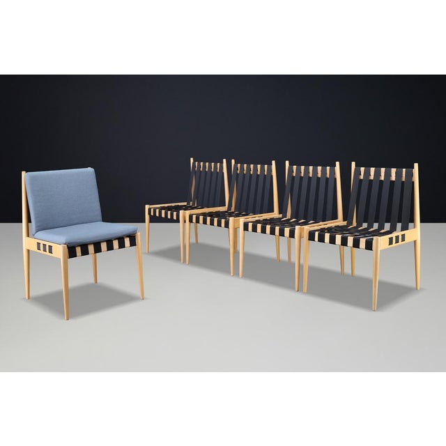 A large and refined set of se 121 dining chairs, also known as the “berliner stuhl”, designed by egon eiermann and...