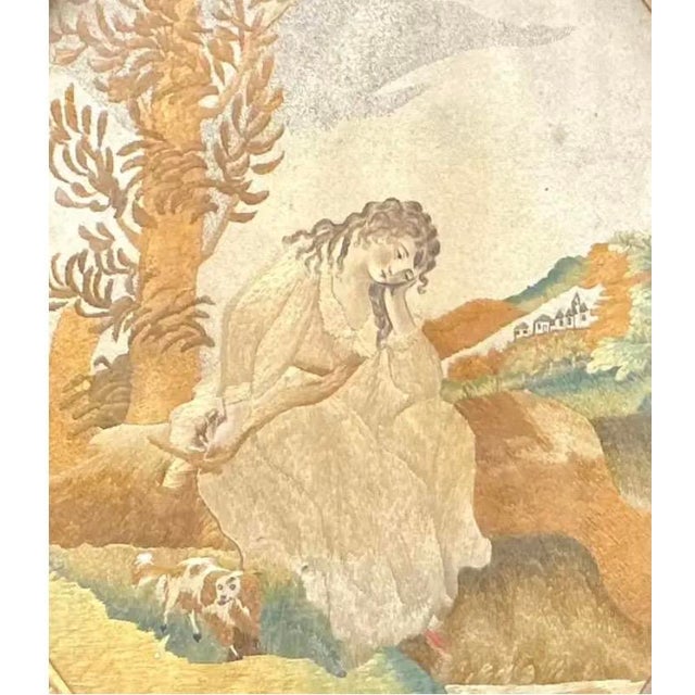 Georgian Oval Silk Embroidery Picture of a Young Girl With Her Dog. Picture depicts a young girl in a pastoral landscape,...