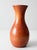 This vintage turned wood vase features a sculptural silhouette with a gently flared rim and a warm, naturally grained...