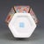This magnificent vase features a classic hexagonal (six-sided) form with a flared rim and a distinctive, angular body. It...