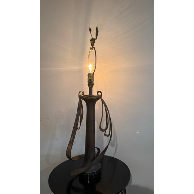 Striking vintage table lamp by Chapman, one of the most collectible names in mid-century American lighting, with maker’s...