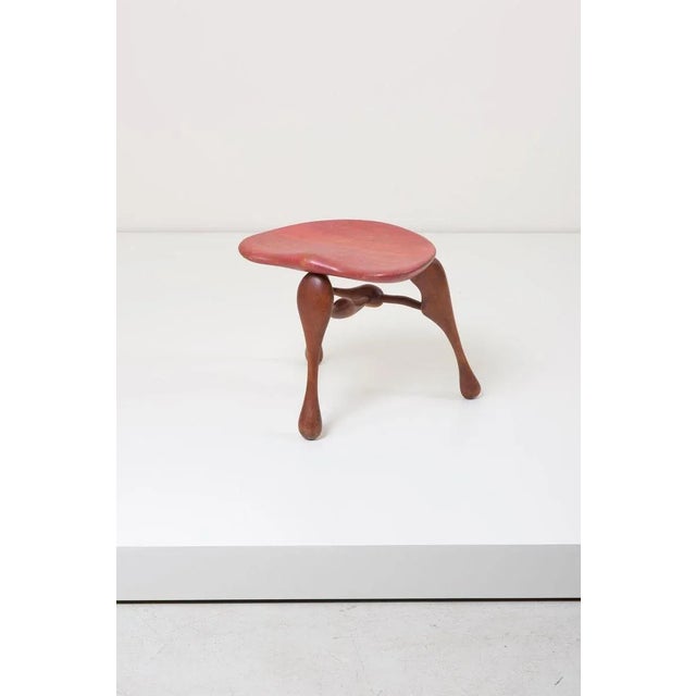 Sculptural handcrafted three legged stool by noted studio furniture maker Ron Curtis. This piece is attributed to the...
