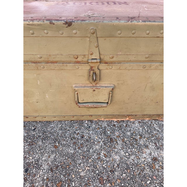 Fantastic vintage army foot locker/trunk makes for creative storage!