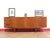 A stunning credenza made by renowned British furniture maker Mcintosh, this Mid Century Modern Vintage Teak Credenza...