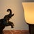 Art Deco Table Lamp in Patinated Bronze and Red Marble Base 1930s A compact table lamp composed around a solid red marble...