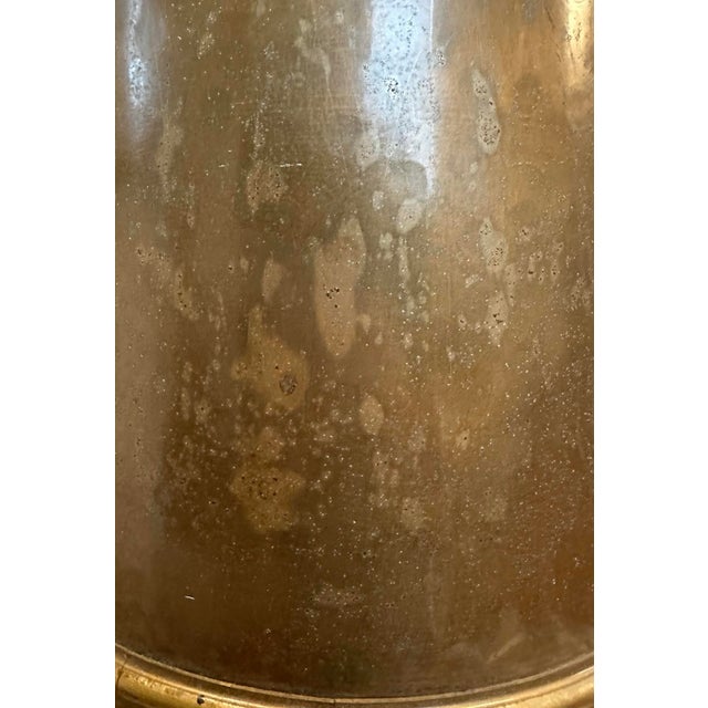 A gorgeous, vintage brass wastebasket by Labrazel. Features an antique/unlacquered brass finish in a cylindrical form with...