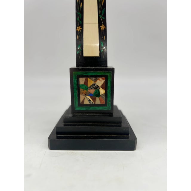Continental, 19th century. A grand tour era (possibly Italian) obelisk constructed with a stepped black marble square...
