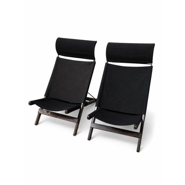 Folding chair designed by Tord Björklund for Ikea. The model is called Hestra. It consists of thick denim fabric, a wooden...
