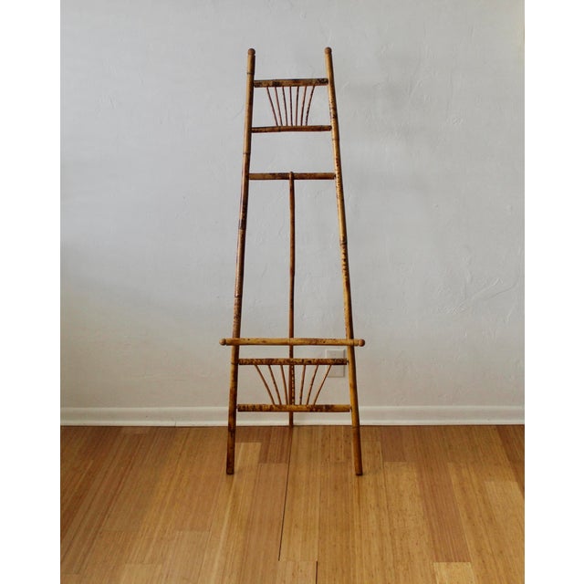 Upgrade your space with this lovely Vintage Boho Burnt Bamboo Easel, a perfect blend of flair and rustic charm. Crafted...