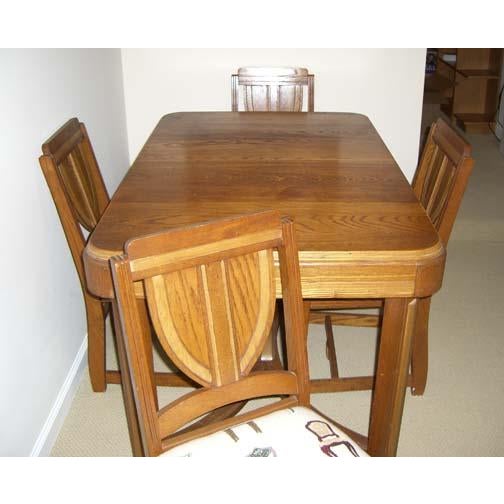 Early 20th Century Solid Oak Dining Table With Stored Table Leaf For Sale In Charlotte - Image 6 of 9