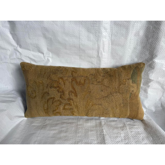 Created from a rare 17th-century Brussels tapestry fragment, this decorative pillow preserves an important piece of...