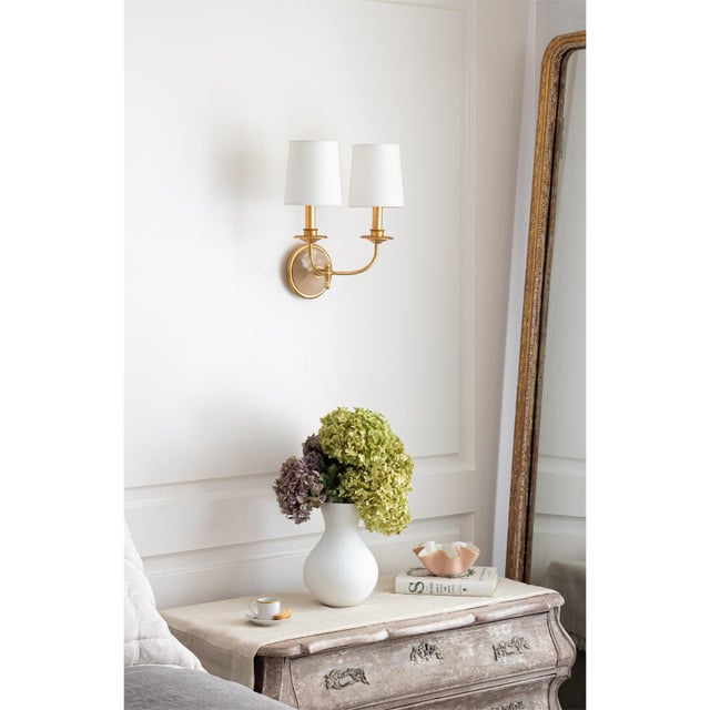 Add a touch of elegant style to your home with the Fisher Sconce. With a serene, cast metal and alabaster dome backplate...