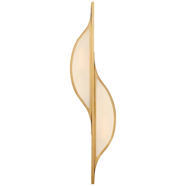 Avant Large Curved Sconce in Antique-Burnished Brass with Frosted Glass Designer: Kelly Wearstler Height: 24.5" Extension:...