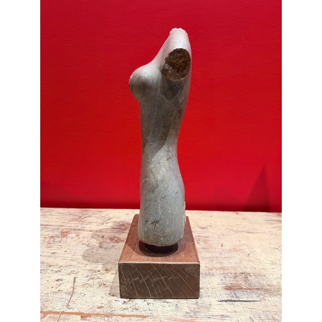 Beautiful stone feminine scupture. Color and artistry ver fine.Color of stone unusual. Lovely decor piece. Piece is about...