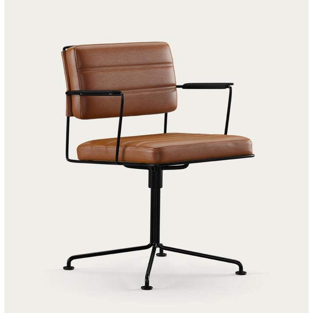 Henrik tengler time chair frame: black, upholstery: cognac for one collection the time chair, designed by henrik tengler...