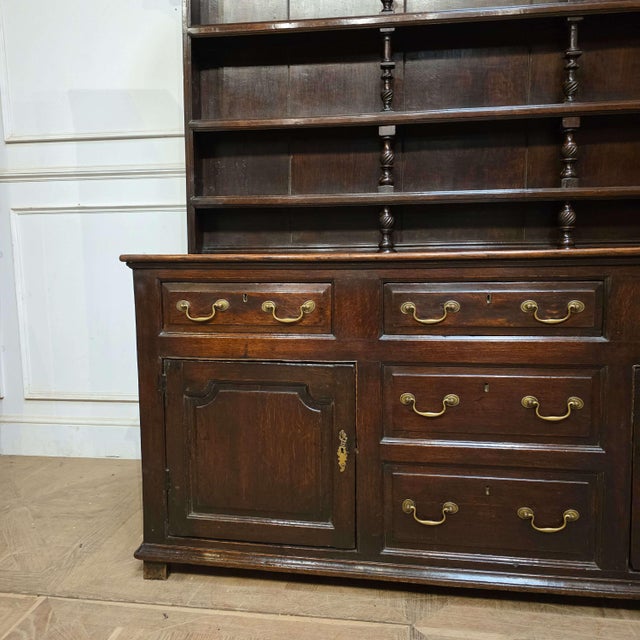 18th century English oak farmhouse dresser with good colour and original brass handles. 1790. Shelf depth: 4-inches (10cm)...