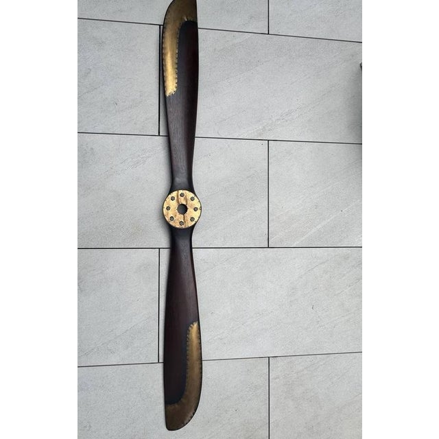 Up for sale is a stunning, large wooden airplane propeller replica. This makes an incredible statement piece for a living...