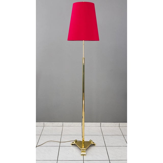 Adjustable Floor lamp with fabric shade around 1950s Polished and stove enameled The shade is replaced ( new ) Adjustable...