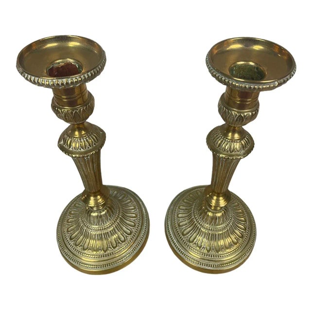 Pair of bronze candlesticks in Louis XVI style. Candle holders of the nineteenth century. Decor very chiselled and...