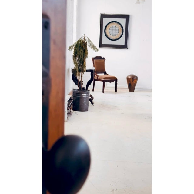 This striking mid-century modern mixed-media piece by Seena Donneson combines geometric abstraction with a metallic gold...