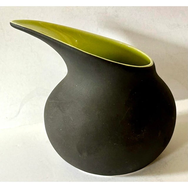 Spanning several design styles; from mcm, space age, organic modernism to contemporary this set with pitcher and tray has...