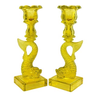 Pair of Museum of Modern Art Yellow Glass Dolphin Candlesticks For Sale