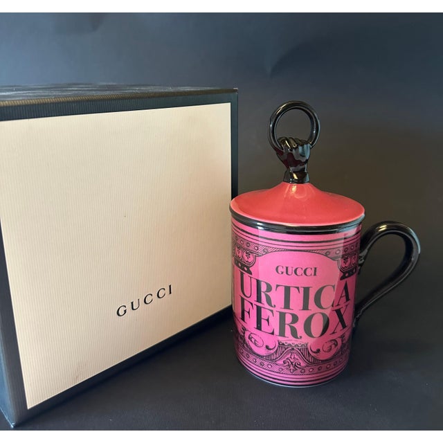 Gucci Richard Ginori fuchsia porcelain coffee mug featuring the words "Urtica Ferox" - a reference to the invitation to...