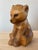 An utterly charming hand carved wood baby bear figurine by Schweizer Heimatwerk of Switzerland.