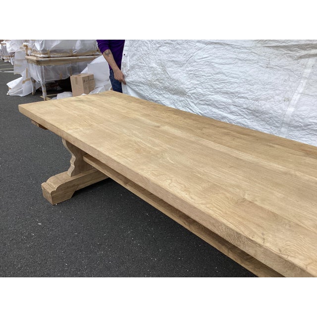 This a rare 10 foot long French farmhouse table. Made of solid oak planks, this table has been stripped of all old...