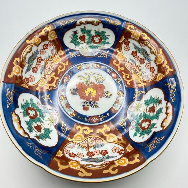 Stunning hand painted Toyo Imari shallow bowl. Bowl is approximately 5.75 inches or 14.5 cm across and 1 - 3/8ths or 3.5...