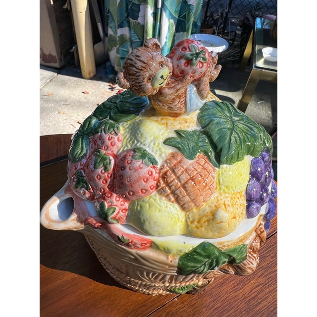 Up for consideration is a beautiful vintage ceramic teapot with fruit and teddy bear accents. This would look lovely in...
