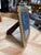 A decorative picture frame with a sculptural border of tightly twisted rope. Its warm gold-tone finish and generous...