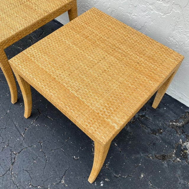 Set of 2 matching end tables are well-made of wood and feature elegant curved front legs and beautifully woven rattan...