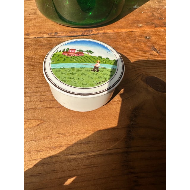 Up for consideration is a beautiful small ceramic farmer painted catchall from Luxembourg. This would look lovely in your...