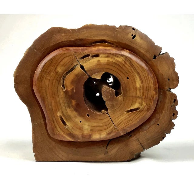 Totally unique Box within a Box hand carved work of art. There are 3 levels to this work. From the tree branch a box has...