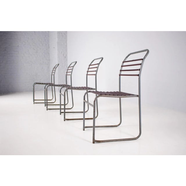 4 stacking chairs in tubular steel and covered springs, british work around 1940/50. H 85 cm x d 50 cm x w 44 cm. H seat...