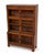 A characterful Minty Ltd Oxford glazed sectional library bookcase, made by Minty Limited – Library Specialists, Oxford....