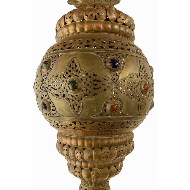 Illuminate your space with exotic elegance. This antique Moroccan hanging lantern is an exceptional example of Middle...