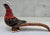 Add a rare hit of color and character to your space with this vintage Artesania Rinconada ceramic pheasant from Uruguay....