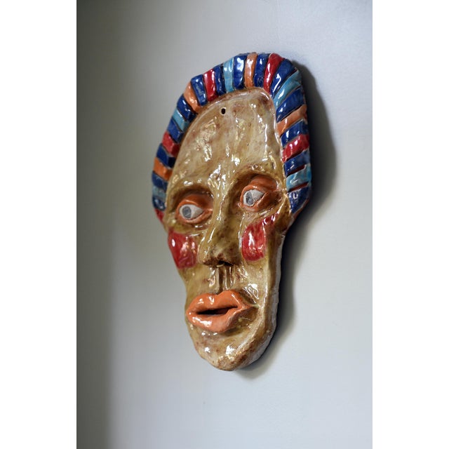 This ceramic wall mask was acquired by artist Tawny Chatmon as part of a larger grouping of masks. These were collected...