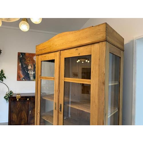 Original Art Nouveau solid wood glass display cabinet, spruce. Dimensions: Height x Width x Depth 212 x 131 x 59 cm. For...