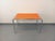 Vintage 1970s Space Age desk, fully refurbished orange vinyl top, tubular chrome legs in the style of Marcel Breuer, very...