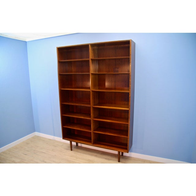 Danish Rosewood Bookcase by Poul Hundevad for Gunni Omann, 1970s, in Very Good conditions. Designed 1970 to 1979 I have...