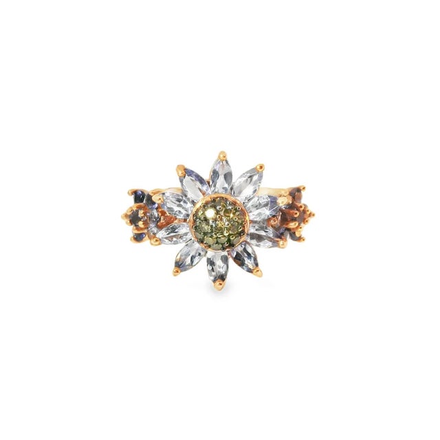 14K pink rose gold sunflower-inspired band ring featuring 10 marquise-shaped natural iolites, 14 round tanzanites total...