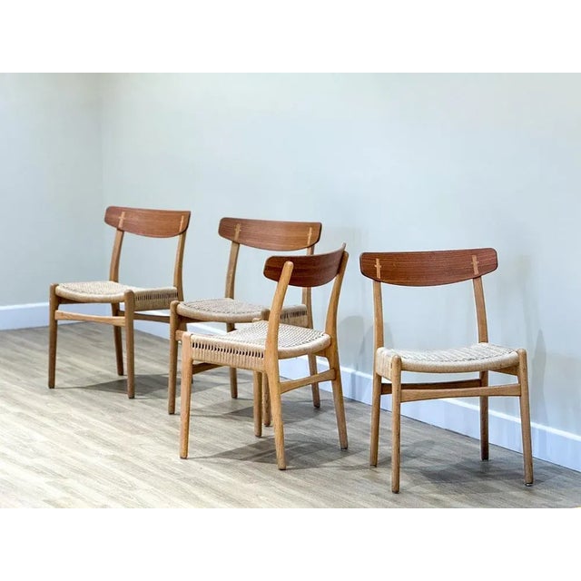 A masterpiece of mid-century design, the ch23 dining chair stands as one of the earliest creations hans j. Wegner crafted...