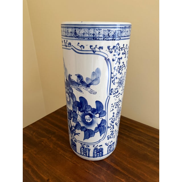 A gorgeous Chinoiserie blue and white porcelain umbrella or cane stand with Asian floral designs and birds China, Late...
