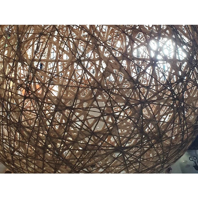 "CAPìTO" spherical lamp in 100% natural rope. The base is made of poplar wood. This piece has an attribution mark, I am...
