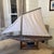 am absolutely obsessed with the incredible, weathered soul of this antique pond yacht. It has that perfect, unaltered...
