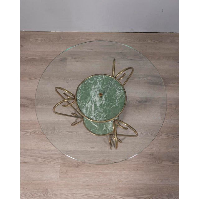 Coffee table with gilded brass frame and faux green marble details, clear glass top, Italian design, 1950s.